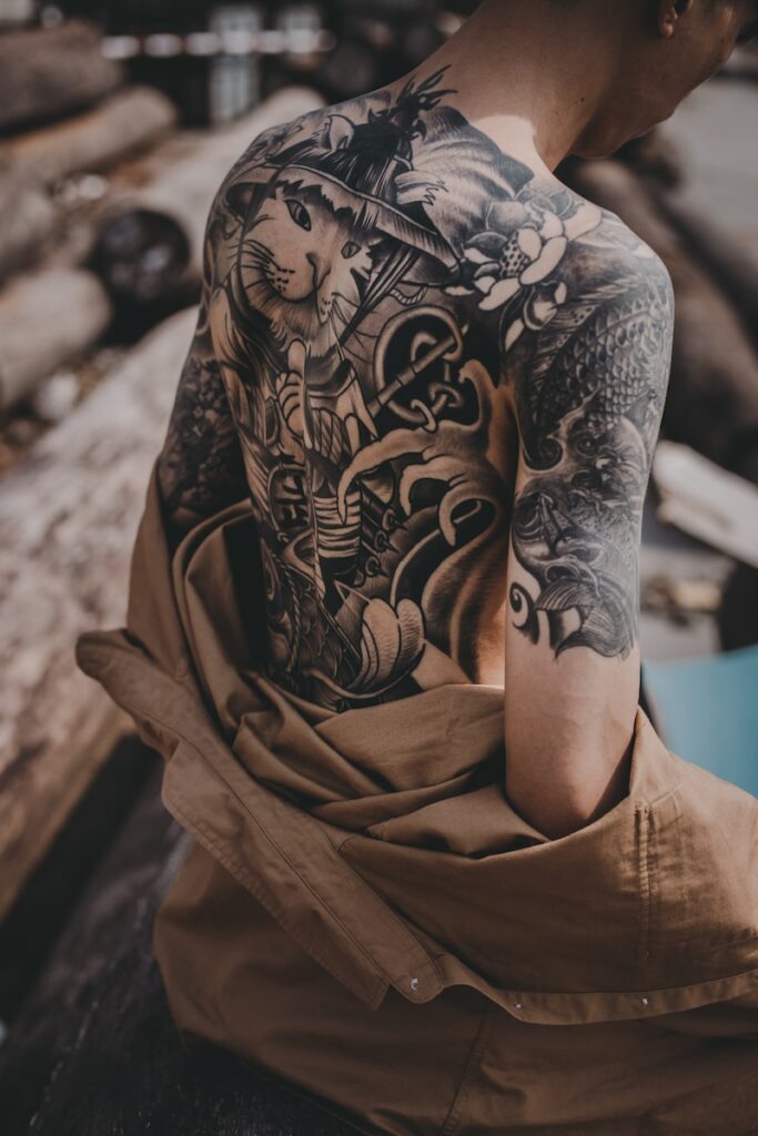 Back and Sleeve Tattoo